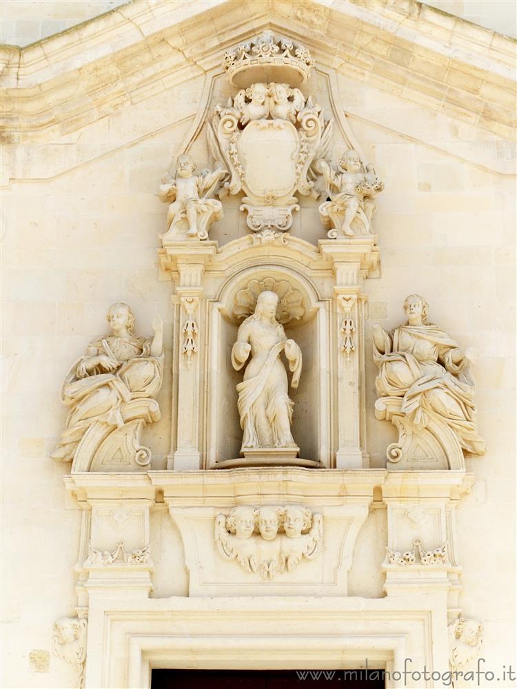 Uggiano La Chiesa (Lecce, Italy) - Baroque decorations above the entrance the Church of Santa Maria Maddalena